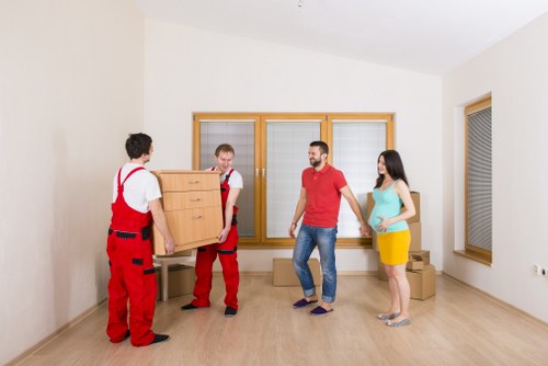 Highbury moving team separating recyclable packing materials