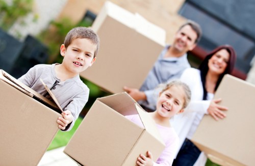 Local furniture collection team handling bulky items in Highbury