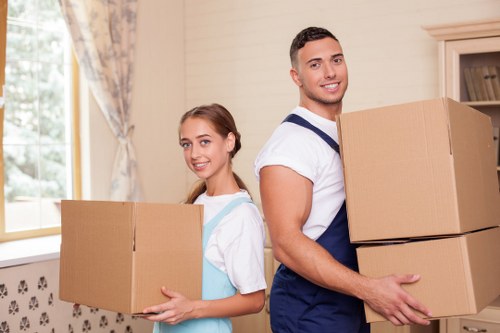 Careful unloading of furniture from a removals van in Highbury