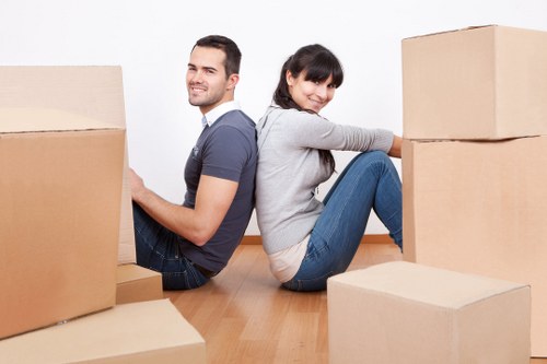 Boxes and furniture being prepared for truck hire in Highbury