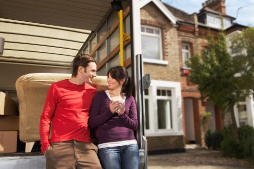 Loading household items into a removal truck